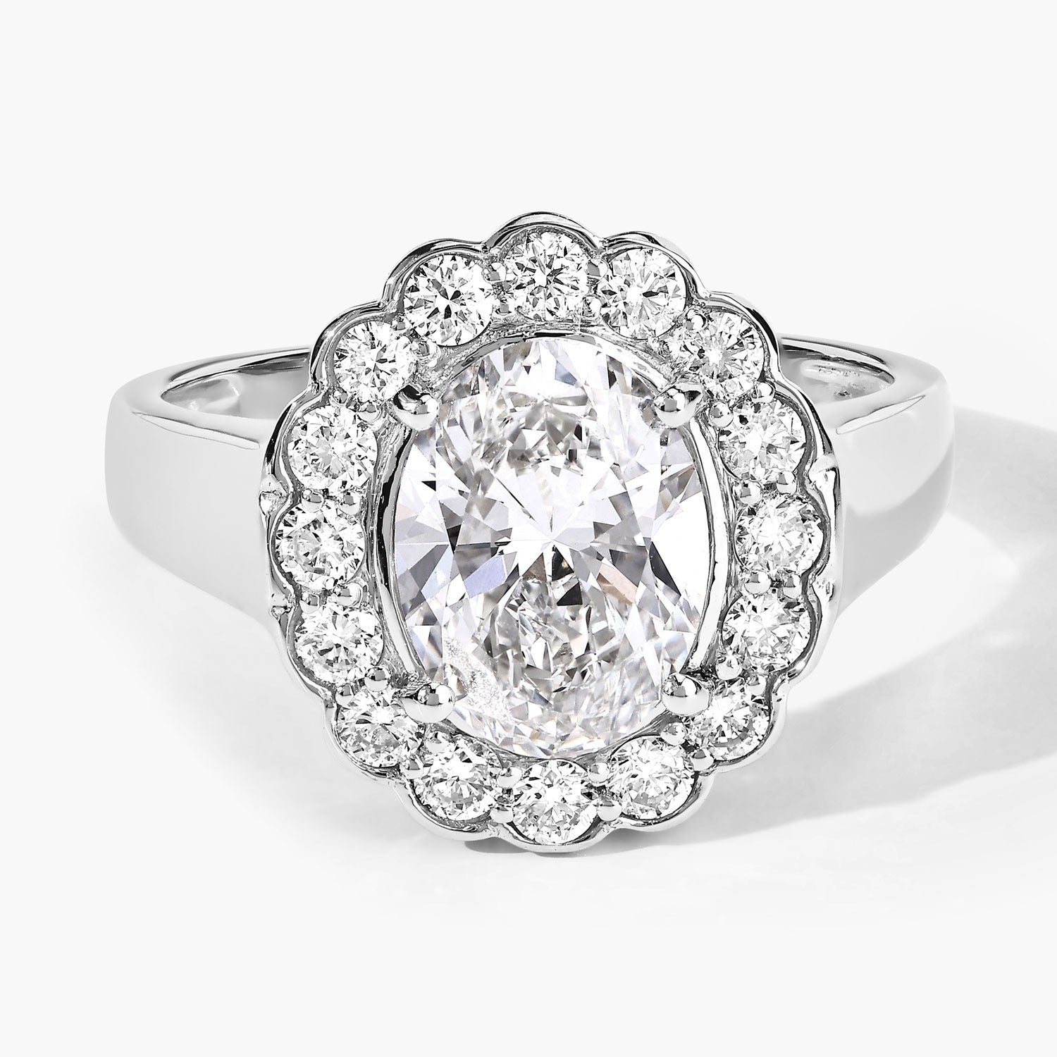 2.48 Ct Oval Lab Grown Diamond Prong Platinum Floral Halo Bridal Ring
