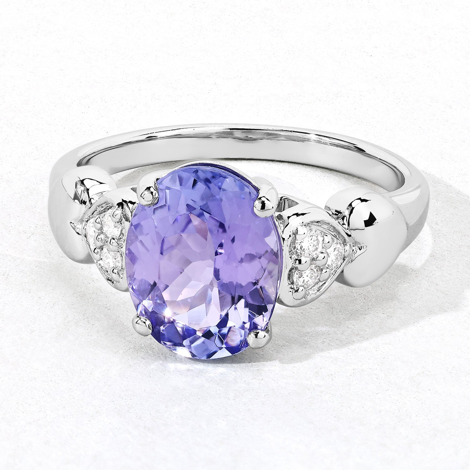 2.94 Cttw Oval Violet Tanzanite and Lab Diamond Rhodium over Silver Heart Shoulder Ring