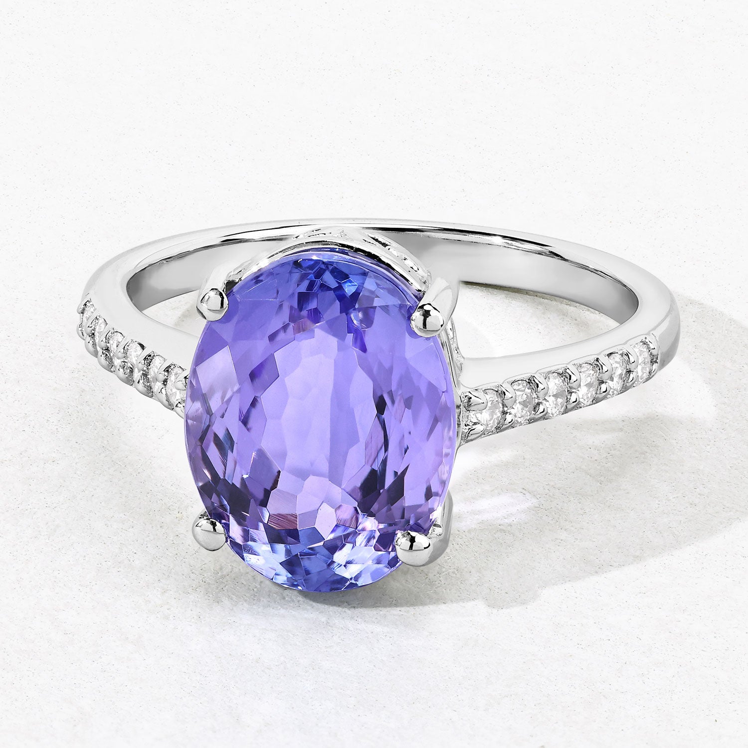 3.66 Cttw Oval Violet Tanzanite and Lab Grown Diamond Rhodium over Silver Bridge Ring