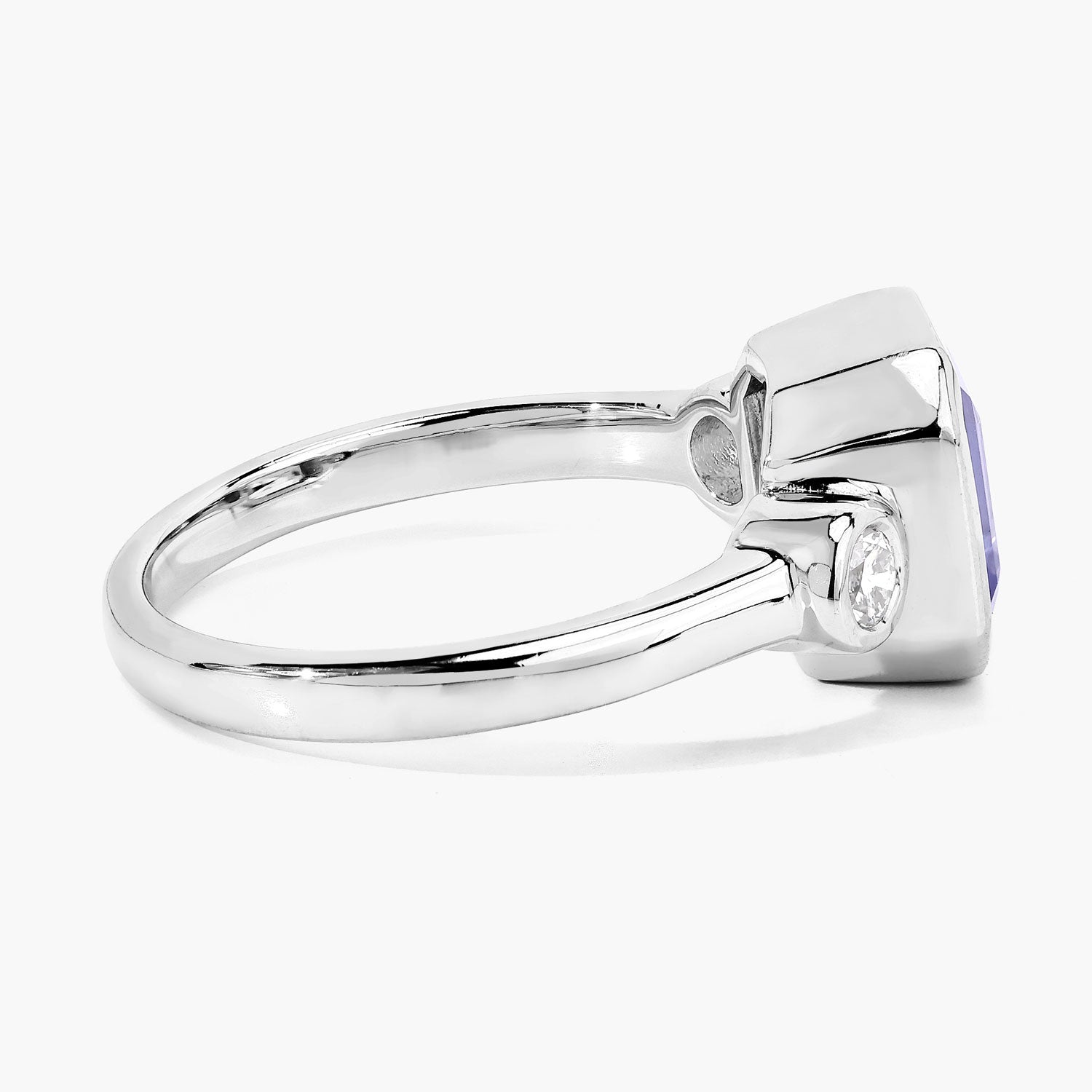 3.49 Cttw Octagon Violet Tanzanite and Lab Diamond Bezel Rhodium over Silver 3-Stone Ring