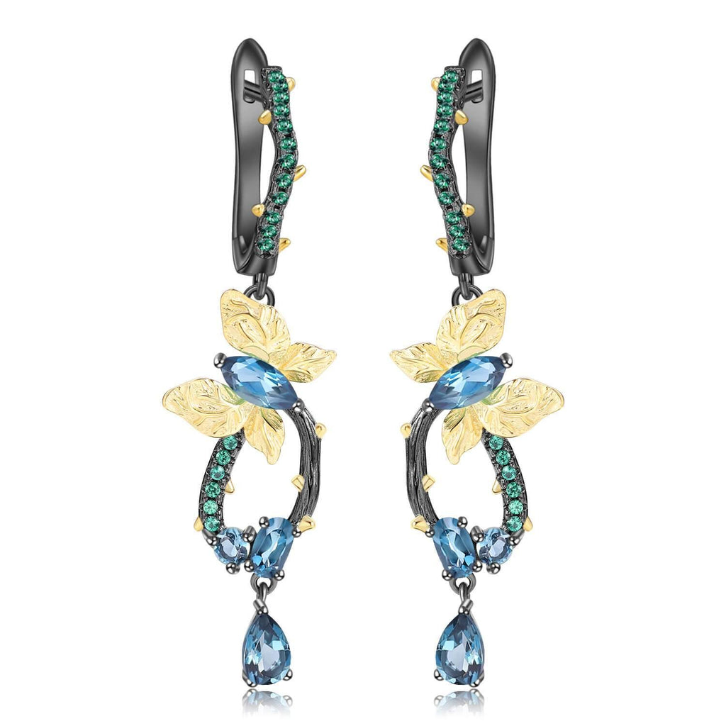 Artisan Blue Topaz Gold-Plated Butterly Earrings.
$ 50 - 100, Blue Topaz, Marquise, Oval, Pear, Blue, Green, 925 Sterling Silver, 925 Sterling Silver Ð Gold Plated Yellow, Dangle, Drop