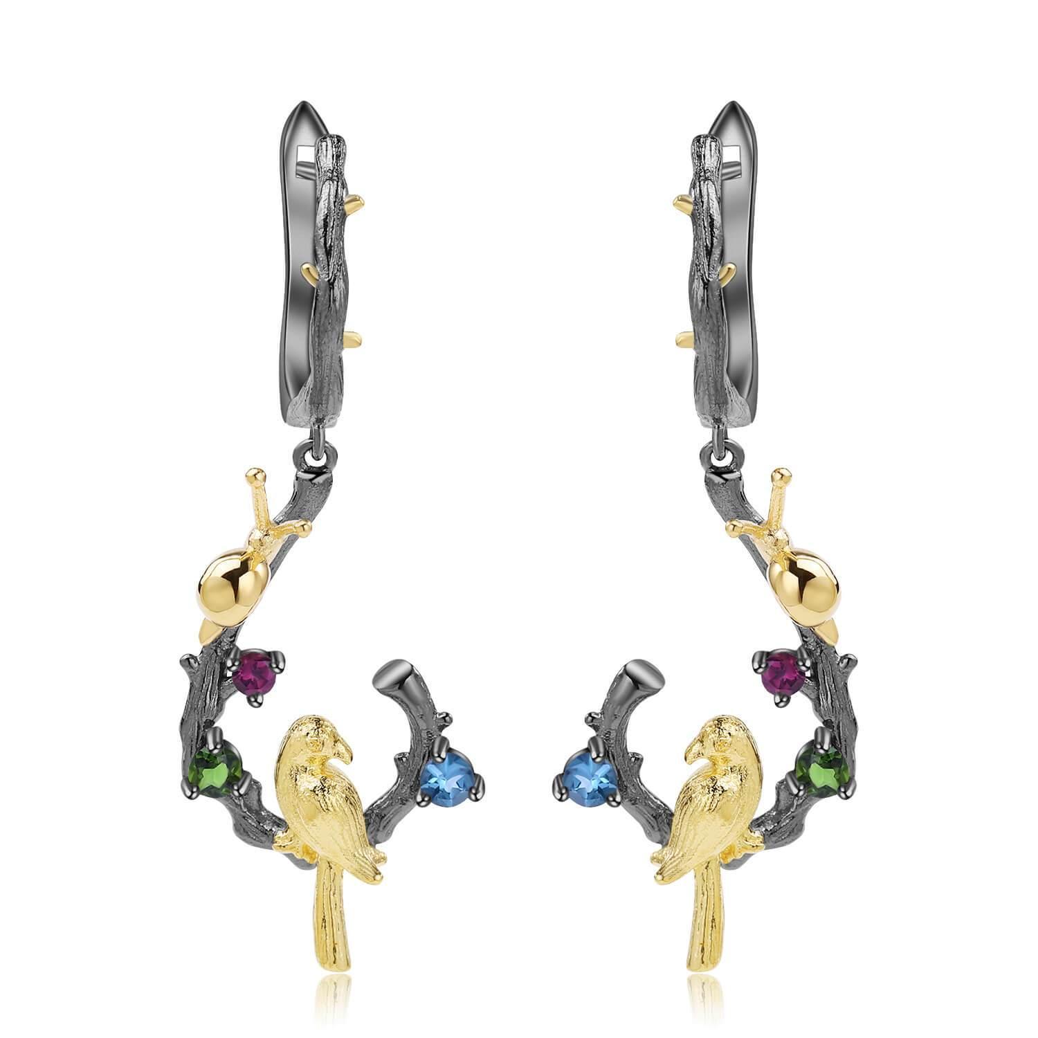 Exotic Nature Inspired Gold Plated Robin Earrings.
$ 50 - 100, Blue Topaz, Garnet, Red, Green, Blue, Round, 925 Sterling Silver, 925 Sterling Silver Ð Gold Plated Yellow, Dangle