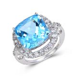 Sterling Silver Cushion Blue Topaz Ring, Accented with White Topaz.
$ 150 – 200, 7, Blue, Emerald Cut, Blue Topaz, White Topaz, 925 Sterling Silver, Statement