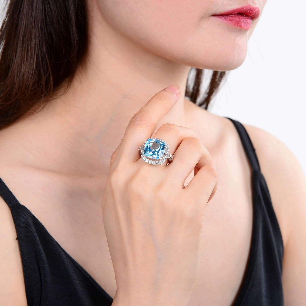Sterling Silver Cushion Blue Topaz Ring, Accented with White Topaz.
$ 150 – 200, 7, Blue, Emerald Cut, Blue Topaz, White Topaz, 925 Sterling Silver, Statement