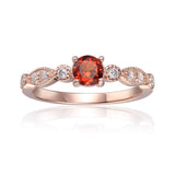 Spessartite Round Solitaire Ring, Round cut ring in rose gold with moissanite stones